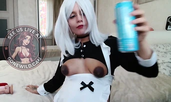 Sexy White-Haired Cosplay Maid in Lingerie Teases with Toy